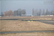 The runway with buildings and hangars