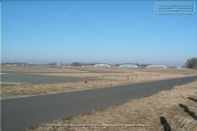 The runway with buildings and hangars