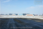 The runway with buildings and hangars